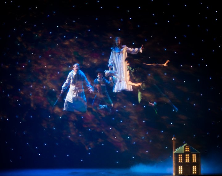 Peter Pan and the Kids fly through the streets of London in Neptune Theatre's production